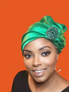 Expertly crafted for a touch of elegance, the JNY-535 boasts a beautiful green turban adorned with a stylish brooch. Perfect for special occasions or everyday wear, this unique accessory adds a sophisticated flair to any outfit. Show off your fashion-forward sense with this stunning piece. Elegant Green Hair Accessories For Gifts, Elegant Green Hair Accessories For Gift, Green Headband For Party, Green Adjustable Headwrap For Party, Elegant Headwrap Headband For Gift, Elegant Headwrap Headband Gift, Elegant Green Headwrap For Party, Elegant Green Headwrap For Weddings, Green Headband For Wedding