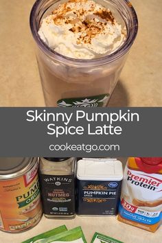 pumpkin spice latte in a glass with whipped cream on top