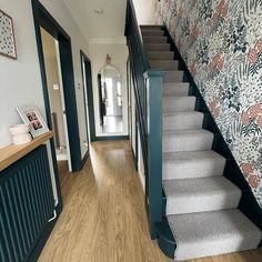 the hallway is clean and ready to be used as a home decorating area for guests