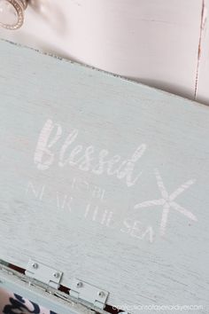 an old wooden box with the words, blessing and starfish painted on it's side