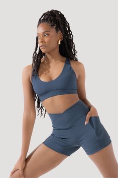 Crisscross Hourglass® Midi Shorts with Pockets (Ribbed) - Dark Navy – POPFLEX® Versatile Activewear With Built-in Padding And 4-way Stretch, Supportive Bottoms With Built-in Bra For Yoga, Supportive Yoga Bottoms With Built-in Bra, 4-way Stretch Athleisure Activewear With Contoured Waistband, Athleisure Activewear With 4-way Stretch And Contoured Waistband, Compression Activewear With Built-in Bra And Short Length, Supportive Activewear With Built-in Shorts For Workout, 4-way Stretch Sportswear Activewear With Contoured Waistband, 4-way Stretch Activewear With Contoured Waistband