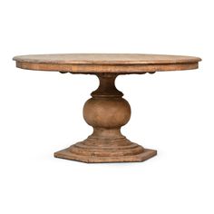 a round wooden table with two pedestals on each side and an oval base at the top