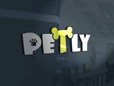 the word petly written in cut out letters with a dog paw on it's side