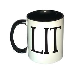 a black and white coffee mug with the word lil on it's bottom half