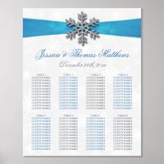 a white and blue snowflake wedding seating chart