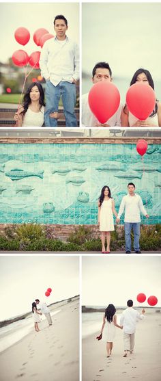 a couple holding hands and walking on the beach with red balloons in front of them