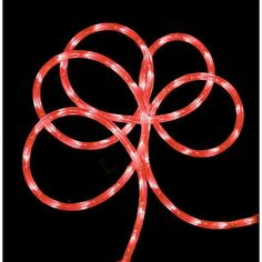 a red string light on a black background