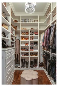 the closet is full of shoes and clothes