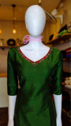 Bottle green color cotton silk kurta with cotton lining . Beautiful thread and beaded work on the neck. sleeve length:3/4th kurti length:46 Thread Work Neck Designs For Kurtis, Green Resham Embroidered Cotton Silk Blouse Piece, Green V-neck Kurta With Resham Embroidery, Chanderi Kurta With Embroidered Neckline And Long Sleeves, Long Sleeve Chanderi Kurta With Embroidered Neckline, Elegant Festive Salwar Kameez With Embroidered Neckline, Green Long Sleeve Cotton Silk Salwar Kameez, Green V-neck Kurta For Eid, Traditional Chanderi Kurta With Embroidered Neckline