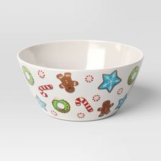 a white bowl with christmas decorations on it