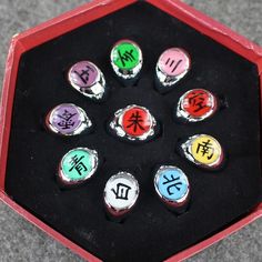 seven chinese symbols are in a red box on the floor, with black velvet lining