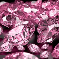 many pink diamonds are scattered around each other