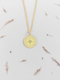 ♥ 14k Gold Compass Necklace * Coordinates Charm ♥ MATERIAL The whole jewelry is made from 14k SOLID GOLD ♥ The inner diameter of the jump ring is 4mm ♥ Pendant thickness is 0.5mm ♥ FREE EXPRESS SHIPPING ♥ NO IMPORT OR CUSTOMS FEES TO THE USA AND THE EU  For all other countries Import and customs fees are the buyers responsibility ♥♥ PACKAGING All items come in a beautiful gift box Please do not hesitate to message me, I am one click away from you and I always love hearing your questions and comm Gold Compass Necklace, Engraved Compass, Compass Necklace, Gold Engraving, Bird Earrings, Beautiful Gift Boxes, Gold Material, Custom Engraving, Spring Rings