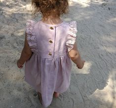 Gorgeous baby girl or toddler dress made of highest quality washed 100 % linen with ruffle lace. Perfect for your little one's baptism, flower girl, first birthday or other special occasion. Clothes made of linen has amazing properties: in the hottest time of the year - cools, in a cool - warms. It's natural, breathing and extremely cute looking! 🌿 Material: 100% linen, Oeko-Tex 100 certified. Lace : linen or cotton Colors: snow white, milk white, greyish sand 🌿 Please note. Each dress is uniq Boho Toddler Girl, Boho Toddler, Rustic Flower Girl, Sleveless Dress, Rustic Flower Girl Dress, Baby Baptism Dress, Boho Flower Girl, Rustic Flower Girls, Vintage Boho Dress