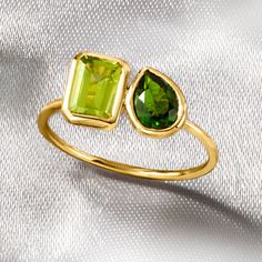 Ross-Simons - .90ct Peridot, .50ct Chrome Diopside Toi et Moi Ring in 14kt Yellow Gold. Size 9. An RS exclusive. French for "you and me," Toi et Moi rings are a unique way to celebrate a special relationship in your life. Wear our on-trend, two-stone designs as a sentimental symbol of romance, friendship, family - or simply treat yourself to double the sparkle! This tonal green statement features a .90 carat emerald-cut peridot shimmering beside a .50 carat pear-shaped chrome diopside. Crafted in 14kt yellow gold. 1/4" wide. Chrome diopside and peridot two-stone ring. Peridot birthstones are the perfect gift for August birthdays. August Birthdays, Peridot Birthstone, August Birthday, Stone Design, Stone Ring, Emerald Cut, Pear Shaped, Stone Rings, Emerald