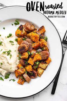 a white plate topped with potatoes and mashed potatoes