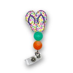 This Sea Shell Flip Flop Badge Reel is the perfect way to make a big splash at the office! Showing off your beach-loving personality with style, its beaded design and retractable, swiveling capabilities keep your ID or access badge just where you need it! Let your coworkers know you don't mess around when it comes to 'work-cessories'! Fun Multicolor Adjustable Badge Holders, Multicolor Retractable Badge Reel, Adjustable Multicolor Retractable Badge Reel, Adjustable Retractable Multicolor Badge Reel, Loving Personality, Big Splash, Trendy Accessories, Id Badge, Sea Shell