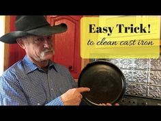 a man wearing a cowboy hat holding a frying pan with the words easy trick to clean cast iron