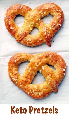 two pretzels with sesame seeds on them and the words keto soft pretzels