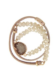 Introducing our Beaded Druzy Wrap Bracelet, a stunning accessory that combines the natural beauty of druzy with intricate beadwork. This bracelet wraps elegantly around your wrist, creating a layered and textured look. The druzy stone centerpiece adds a touch of sparkle and uniqueness, making each piece one-of-a-kind. Crafted with attention to detail, it offers both style and comfort, perfect for everyday wear or special occasions. Whether you're dressing up a casual outfit or adding a finishing touch to evening attire, this bracelet effortlessly elevates your ensemble. Embrace the enchanting allure of druzy and beads with this exquisite wrap bracelet.


Materials: Magnetic Closure
Size: 22" length 0.75" Width Taupe Leather, Touch Of Gold, Leather Wrap Bracelet, Leather Wraps, Bohemian Jewelry, Druzy, Wrap Bracelet, Jewelry Inspiration, Necklaces Bracelets