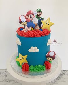 there is a cake with mario and friends on it