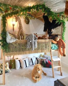 there are many stuffed animals on the bunk bed