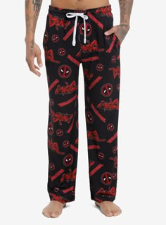 Lounge around with your favorite Merc with a Mouth with these Deadpool pajama pants. Comes with an elasticated drawstring waistband and side seam pockets.92% polyester; 8% spandexWash cold; dry lowImportedListed in men'sunisex sizesModel is 6'1"Model wears size Medium Cartoon Pajama Pants, Deadpool Halloween Costume, Marvel Pajamas, Cutesy Outfit, Deadpool Logo, Deadpool Costume, Mens Pjs, Bday List, Pj Bottoms