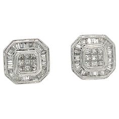 A Pair Of Diamond Square Cut-Cornered Diamond Cluster Stud Earrings. Each earring with 9 invisible set princess cut diamonds within a border of 32 tapered baguette cut diamonds channel set in 18ct white gold. Diamonds 82 = 0.75ct (estimated). Metal: 18ct White Gold Carat: 0.75ct Colour: F Clarity: VS Cut: Princess Cut Weight: 3.72 grams Engravings/Markings: N/A Size/Measurement: N/A Current Condition: Excellent - Consistent with age and use. Accompanied by: These Bespoke Square Cut Diamond Earri Luxury Square Cut Earrings With Diamond Accents, Square Cut, Baguette Cut Diamond, Diamond Cluster, Princess Cut Diamonds, Princess Cut, Bespoke, Jewelry Earrings Studs, Diamond Earrings