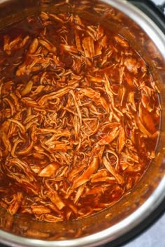 a large pot filled with food on top of a stove