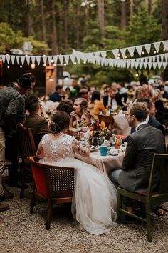 a group of people that are sitting around a table