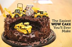 there is a birthday cake with construction trucks on it and the words, the 5th woman's birthday you have to see