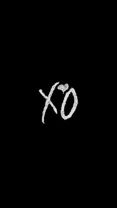 the word xo written in white chalk on a black background