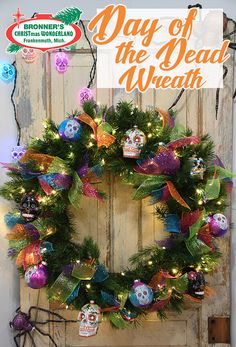 a wreath with skulls and lights on it in front of a door that says day of the dead wreath