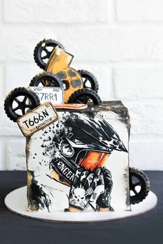 a cake decorated with an image of a man riding a bike on top of it