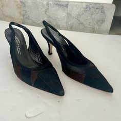 This Is A New Pair Of Lerre Slingback Heels For Women With A Pointed Toe Shape And Peep Toe Style And Mid Heel. The Shoes Are Made Of Black Cowhide Or Calf Hair. The Lining And Insole Are Made Of Leather, While The Outsole Is Made Of Suede. The Strap Has Some Band Stretch. Vero Cuoio Leather Hand Made In Italy. Designer Brown Slingback Pumps For Evening, Luxury Brown Slingback Pumps For Evening, Black Slingback Pumps With Pointed Toe And Leather Lining, Fitted Leather Sole Slingback Pumps For Evening, Chic Brown Slingback Pumps For Formal Wear, Chic Brown Slingback Pumps For Formal Occasions, Elegant Black Slingback Pumps, Elegant Black Fitted Slingback Pumps, Elegant Fitted Black Slingback Pumps