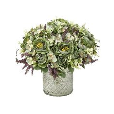 a vase filled with green and white flowers