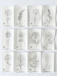 the flowers are drawn on white paper with numbers