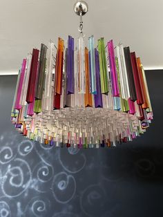 a multicolored chandelier hanging from the ceiling