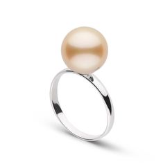 This 10.0-11.0 mm AAA quality golden South Sea pearl ring showcases the pure organic beauty of an exotic golden pearl. The flawless pearl appears to float above the gold, yet is securely attached by a strong post. The classic-style ring features a 3 mm, 14-karat gold band. Pearl Ring Design, South Sea Pearl Ring, Cultured Pearl Ring, Golden Pearl, Golden South Sea Pearls, Gold Diamond Engagement Rings, Jewelry Appraisal, Golden Jewelry, Sea Pearl