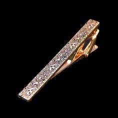 A gold colored intricate vine design tie bar Elegant Gold Rectangular Suit And Tie Accessories, Classic Gold Cufflinks For Party, Tie Bar, Color Textures, Tie Clip, Rich Color, Neck Tie, Cufflinks, Take That