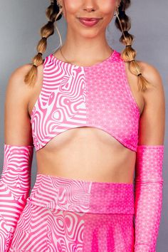 "Get ready to electrify the dance floor (literally) with our Electricity Teaser Top! This rave essential will add a playful shock to your outfit, making you stand out from the crowd. Keep the party going all night long with this electrifying top 🔥" Product Details: Duality but Neon Pink 🩷 FRW Exclusive! UV Reactive! Made on Recycled Material ♻️ 85% Recycled PET Polyester 15% Spandex Made in San Diego, CA Lifetime Warranty Satisfaction Guaranteed *Talia is wearing a size X-Small. Due to varying screen display settings, you may see some fabric images brighter or darker than the real fabric. So please consider that tolerance before ordering based on the website images. Fabric Images, Light Up The Night, Website Images, Uv Reactive, Rave Outfit, Cut Top, On The Dance Floor, Festival Style, Rave Wear