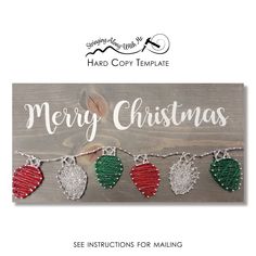 a christmas card with three hearts hanging from it's sides and the words merry christmas on