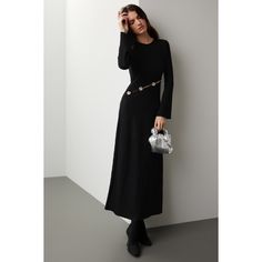 Black knit (92% Viscose, 8% Spandex). A-line. Long sleeves. Crewneck. Pull on. 46" from shoulder to hemline. Made in the USA of imported fabric. Fall A-line Maxi Dress For Night Out, Stretch A-line Maxi Dress For Evening, Winter A-line Midi Dress For Night Out, Stretch A-line Maxi Dress For Night Out, Chic Evening Maxi Dress In Fit And Flare Style, A-line Stretch Maxi Dress For Work, Chic Fit And Flare Maxi Dress For Evening, Chic Fit And Flare Evening Maxi Dress, Fall Night Out A-line Maxi Dress