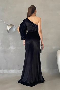 Unique and modern one shoulder long sleeved evening dress Elegant One Sleeve Dress For Fall, Elegant One Shoulder Maxi Dress For Party, Black One Shoulder Dress For Formal Parties, Black One Shoulder Dress For Party Season, Fitted One-shoulder Evening Dress For Party Season, Elegant One Shoulder Party Dress For Fall, Elegant One-shoulder Party Dress For Fall, Elegant One Shoulder Maxi Dress For Banquet, Chic One Shoulder Floor-length Evening Dress