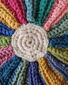 a crochet pattern with many colors on it