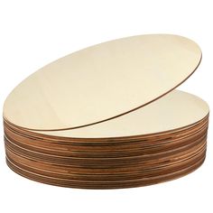 a stack of wooden plates sitting on top of each other