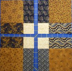 four squares are arranged on a blue and white table cloth, each with different patterns