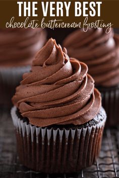 the very best chocolate buttercream frosting on a cooling rack with cupcakes in the background