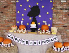 a birthday party with pumpkins and decorations