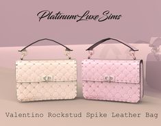 two pink and white purses sitting next to each other